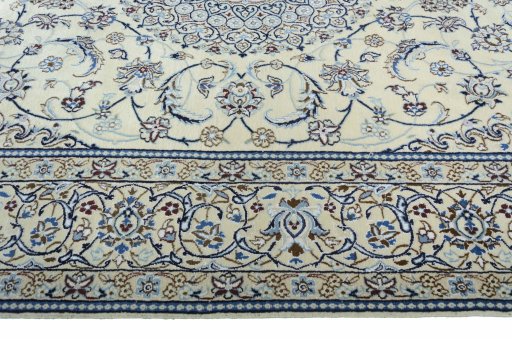 Corner detail of New Nain rug showing border pattern and Wool pile