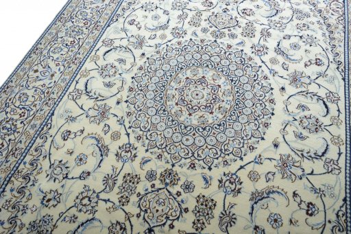 Backside of handmade New Nain rug showing knot structure and weave density