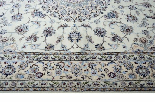 Corner detail of New Nain rug showing border pattern and Cork pile