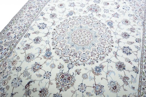 Backside of handmade New Nain rug showing knot structure and weave density