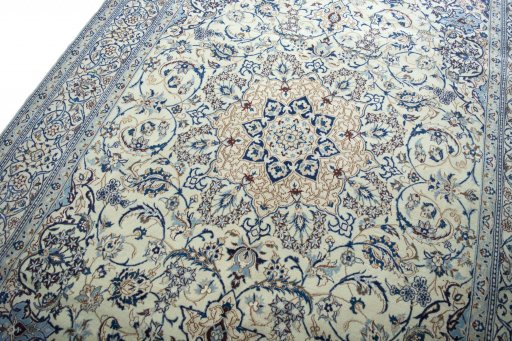 Backside of handmade New Nain rug showing knot structure and weave density