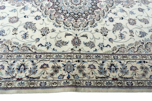 Corner detail of New Nain rug showing border pattern and Cork pile