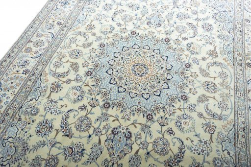 Backside of handmade New Nain rug showing knot structure and weave density