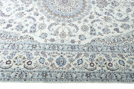 Corner detail of New Nain rug showing border pattern and Cork pile