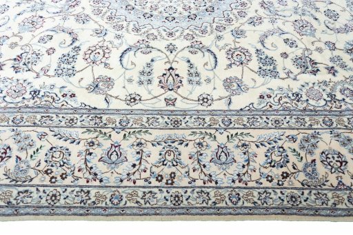 Corner detail of New Nain rug showing border pattern and Cork pile