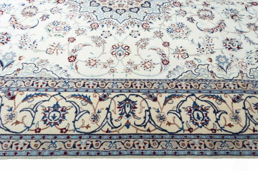 Corner detail of New Nain rug showing border pattern and Cork pile