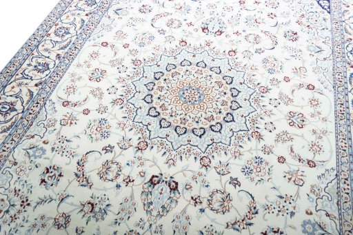 Backside of handmade New Nain rug showing knot structure and weave density