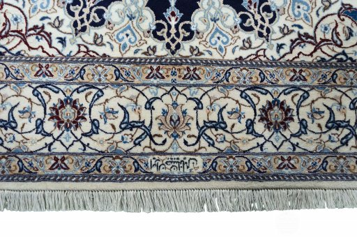 Corner detail of New Nain rug showing border pattern and Cork pile