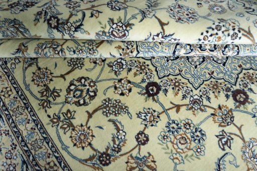 Corner detail of New Nain rug showing border pattern and Cork pile