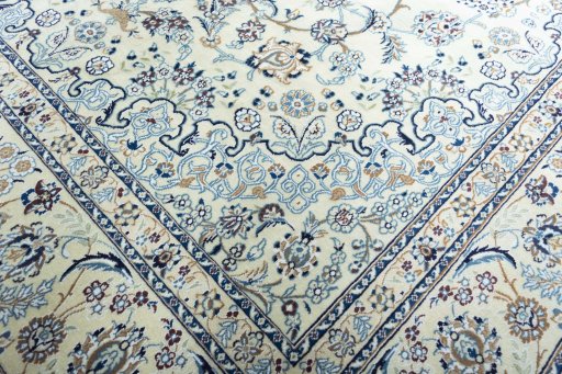 Central medallion detail of New Nain rug from Iran / Persia