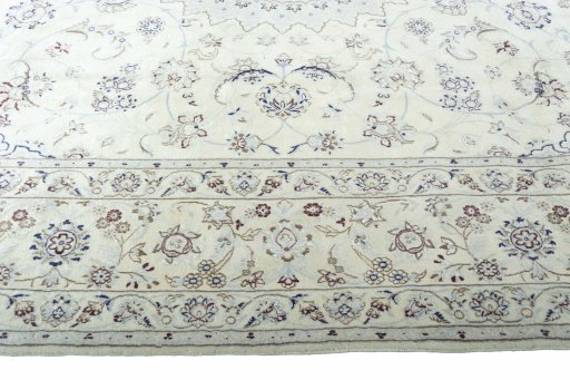 Corner detail of New Nain rug showing border pattern and Wool pile