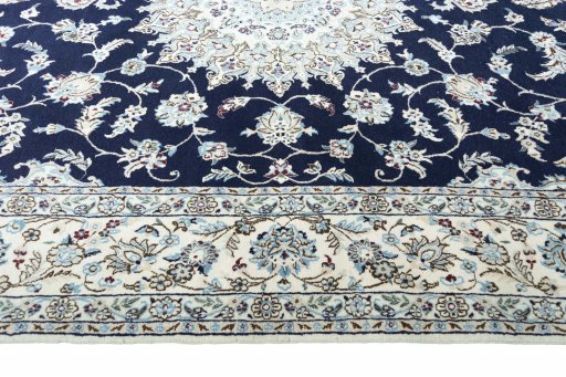 Corner detail of New Nain rug showing border pattern and Wool pile
