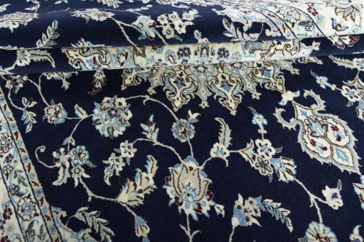 Close-up detail of New Nain rug from Iran / Persia showing Wool weave