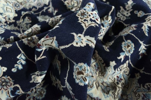 Surface texture of New Nain rug with natural Wool and intricate pattern