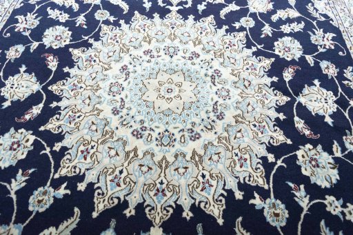 Corner detail of New Nain rug showing border pattern and Wool pile