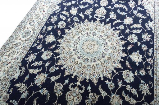 Central medallion detail of New Nain rug from Iran / Persia