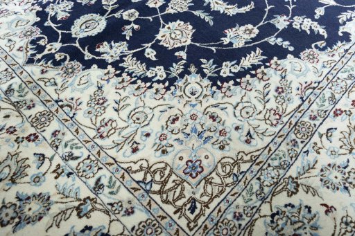 Close-up detail of New Nain rug from Iran / Persia showing Wool weave