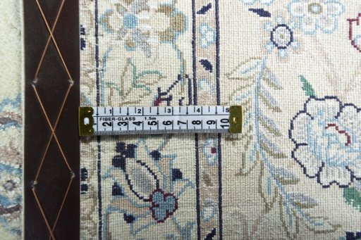 Backside of handmade 2000s Nain rug showing knot structure and weave density