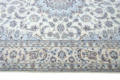 Corner detail of New Nain rug showing border pattern and Cork pile