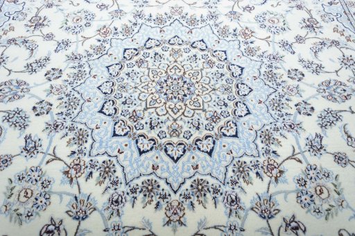 Central medallion detail of New Nain rug from Iran / Persia