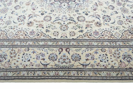 Corner detail of New Nain rug showing border pattern and Cork pile