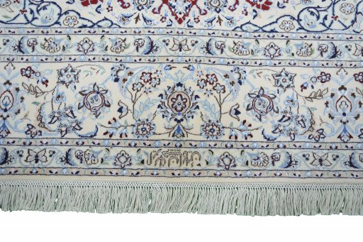 Corner detail of New Nain rug showing border pattern and Cork pile