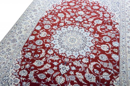 Backside of handmade New Nain rug showing knot structure and weave density