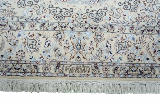 Corner detail of New Nain rug showing border pattern and Cork pile