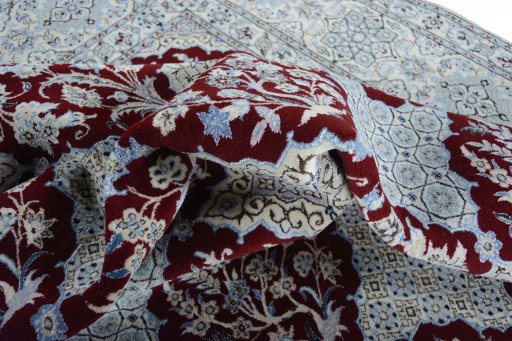 Corner detail of New Nain rug showing border pattern and Cork pile