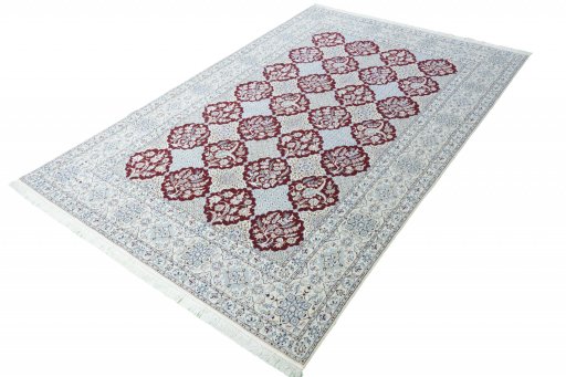 Corner detail of New Nain rug showing border pattern and Cork pile