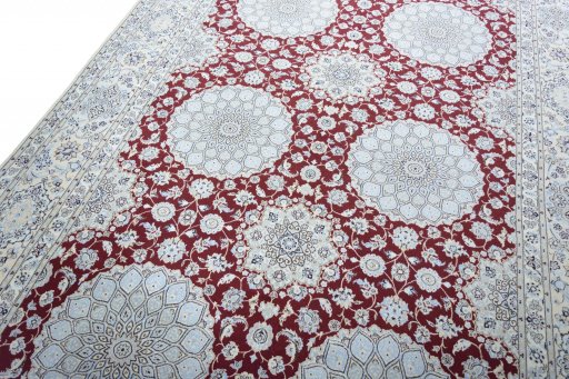 Backside of handmade New Nain rug showing knot structure and weave density
