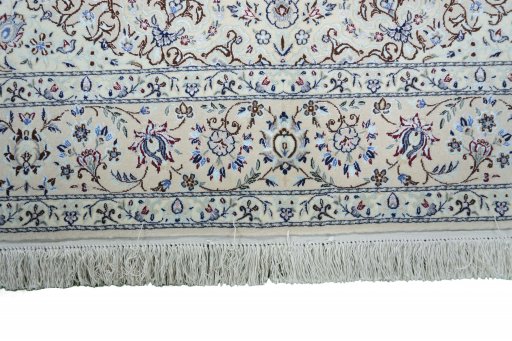 Corner detail of New Nain rug showing border pattern and Cork pile