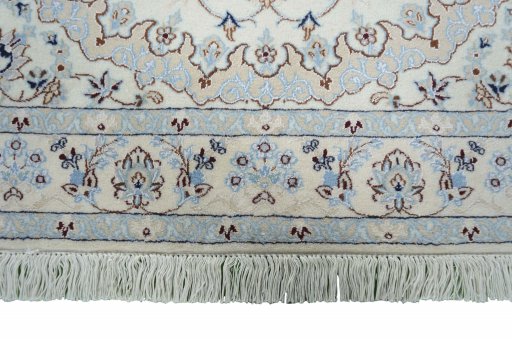 Corner detail of New Nain rug showing border pattern and Cork pile