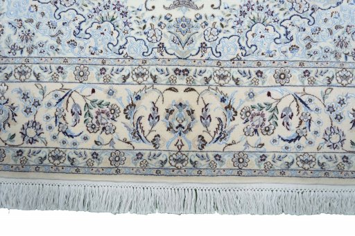Corner detail of New Nain rug showing border pattern and Cork pile