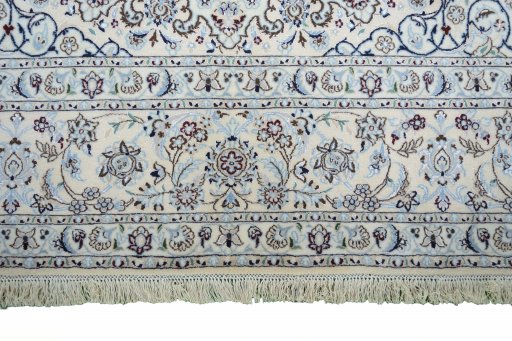 Corner detail of New Nain rug showing border pattern and Cork pile