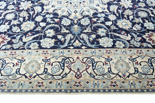 Close-up detail of 2000s Nain rug from Iran / Persia showing Wool weave