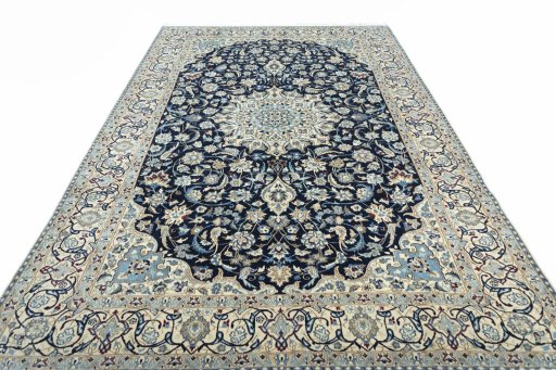 Surface texture of 2000s Nain rug with natural Wool and intricate pattern