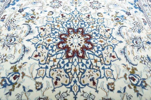 Central medallion detail of 2000s Nain rug from Iran / Persia