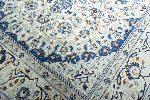 Close-up detail of 2000s Nain rug from Iran / Persia showing Wool weave