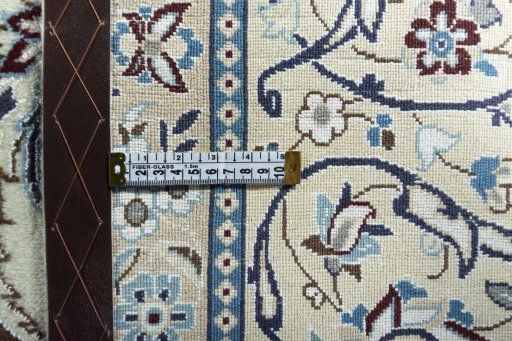 Backside of handmade 2000s Nain rug showing knot structure and weave density