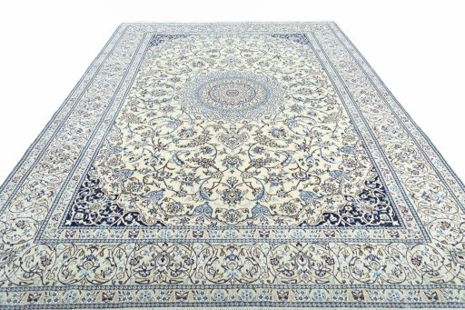 Surface texture of 2000s Nain rug with natural Wool and intricate pattern