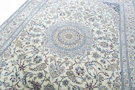 Backside of handmade 2000s Nain rug showing knot structure and weave density