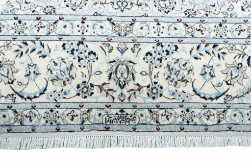 Corner detail of New Nain rug showing border pattern and Cork pile