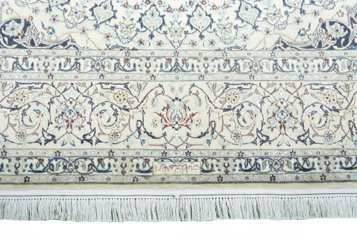 Corner detail of 2000s Nain rug showing border pattern and Cork pile