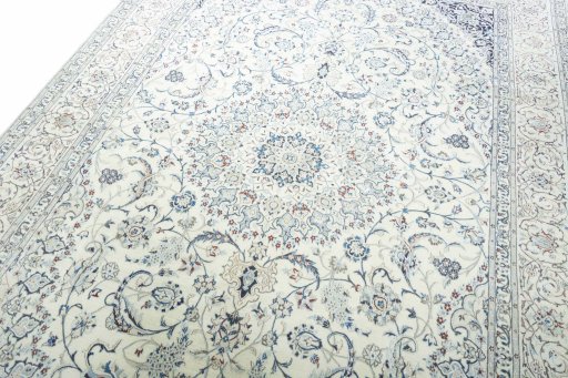 Backside of handmade 2000s Nain rug showing knot structure and weave density