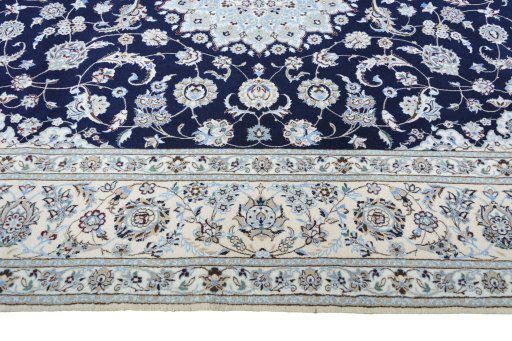 Corner detail of New Nain rug showing border pattern and Cork pile