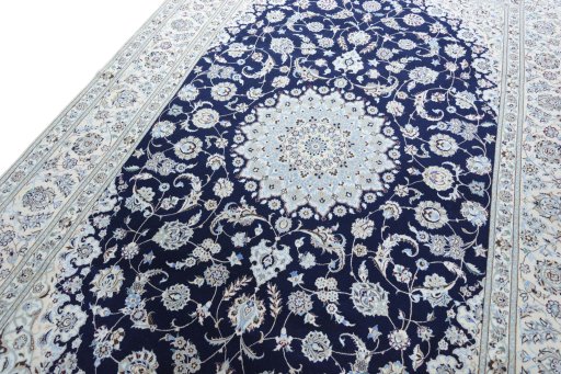 Backside of handmade New Nain rug showing knot structure and weave density