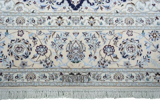 Corner detail of New Nain rug showing border pattern and Cork pile