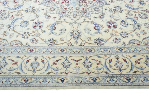 Corner detail of 2000s Nain rug showing border pattern and Cork pile
