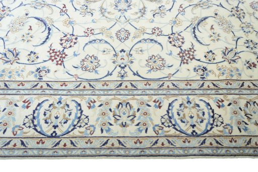 Corner detail of New Nain rug showing border pattern and Wool pile